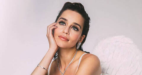 Emilia Clarke featured in Wonderland magazine with silver necklace, earrings and bracelet and angel wings