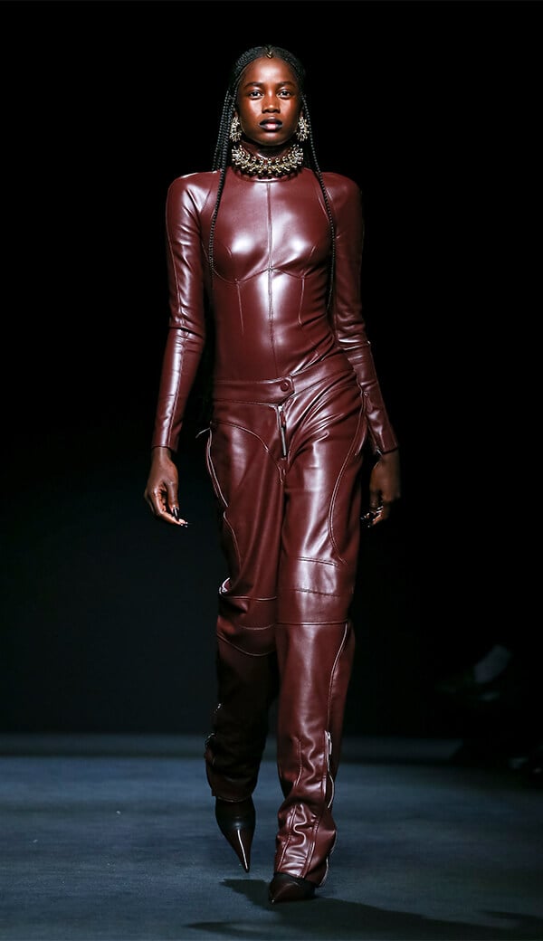 Mama Sané opened the Mugler Fall Winter 2020 show in a brown stretch bodysuit