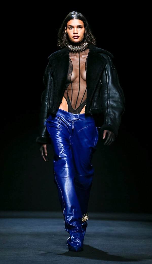 Model in bright blue pants for Mugler Collection for Fall Winter 2020