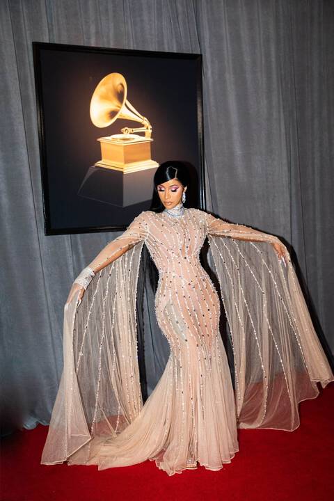 Cardi B in custom Mugler nude colored gown with rhinestones and diamonds on red carpet at the Grammy's