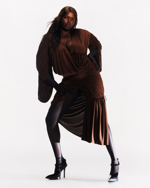 Model in brown flowy Mugler dress