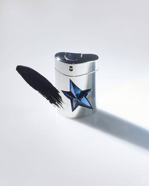 A*Men eau de toiltte silver spray bottle with cutout blue star and black smudge swatch