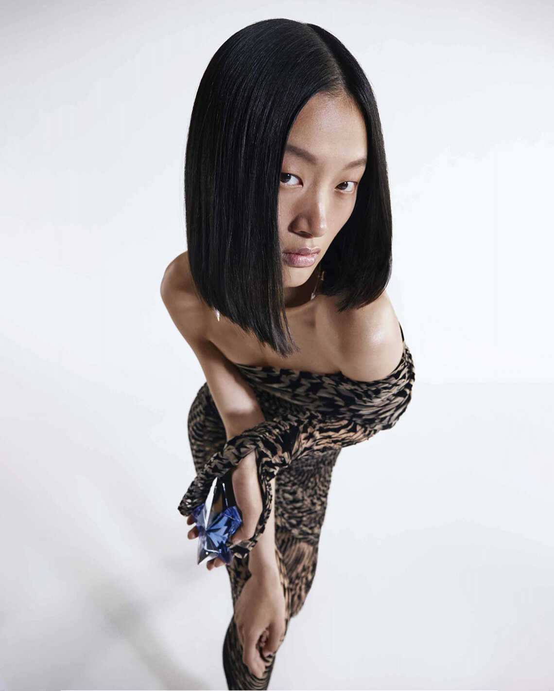 Model in sleeveless leopard dress by Mugler